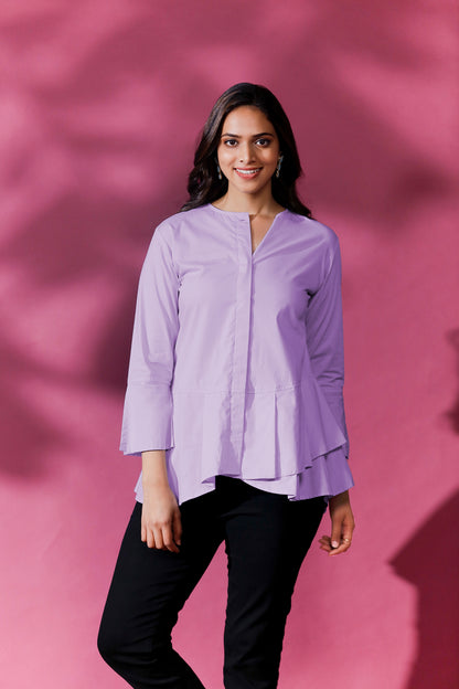 CIRCULAR FRILL SHIRT - This is a classic and stylish shirt with circular frills around the hemline. It is designed with a relaxed fit to provide comfort and ease of movement.