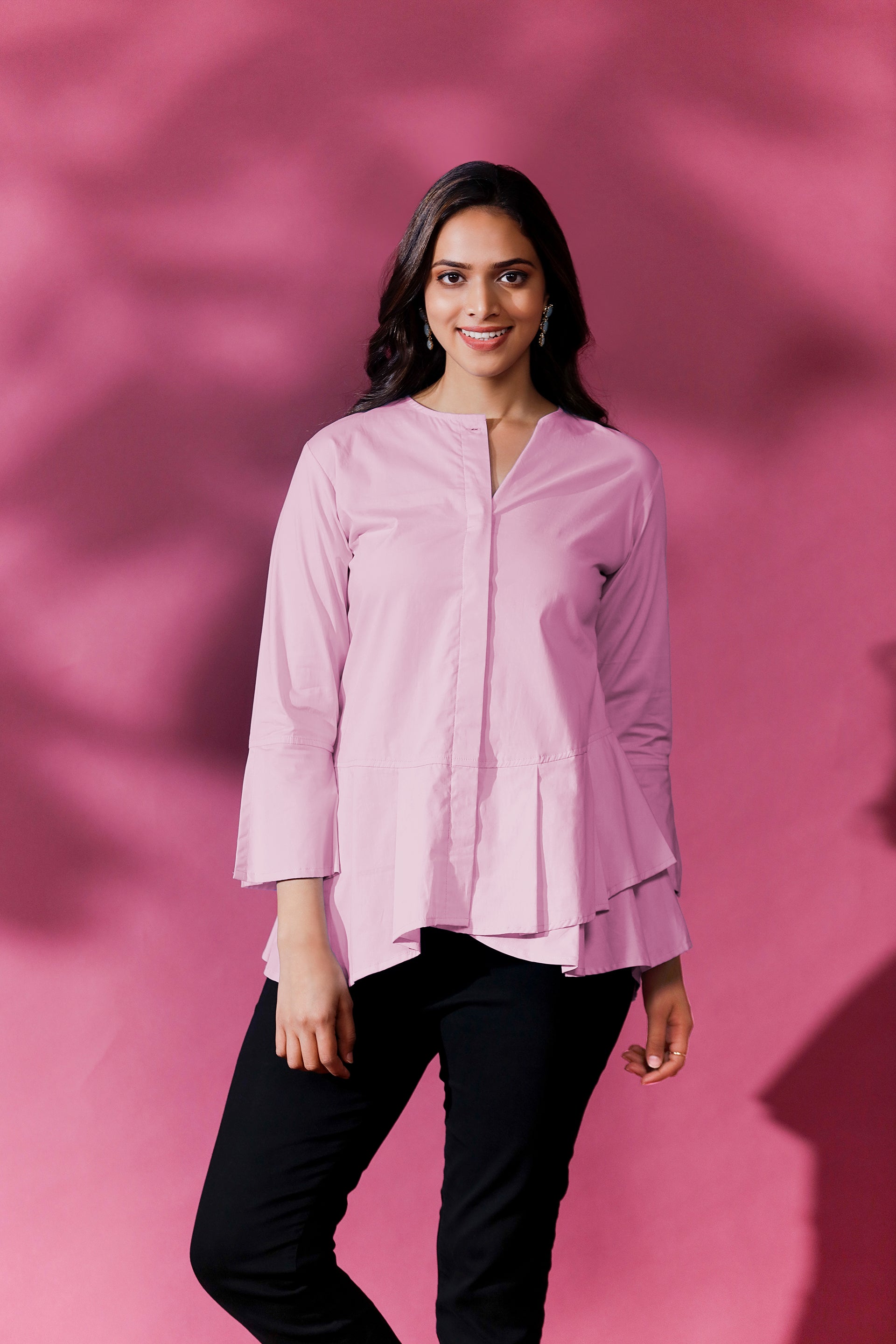 CIRCULAR FRILL SHIRT - This is a classic and stylish shirt with circular frills around the hemline. It is designed with a relaxed fit to provide comfort and ease of movement.