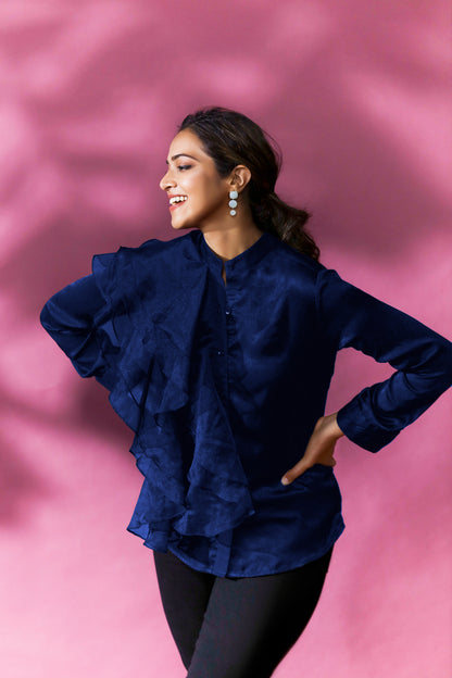 DREAMY ORGANZA RUFFLED SHIRT - This shirt features ruffles made from a sheer and lightweight fabric called organza which creates an ethereal and delicate look. The ruffles create depth and movement giving it a bold and voluminous look too.