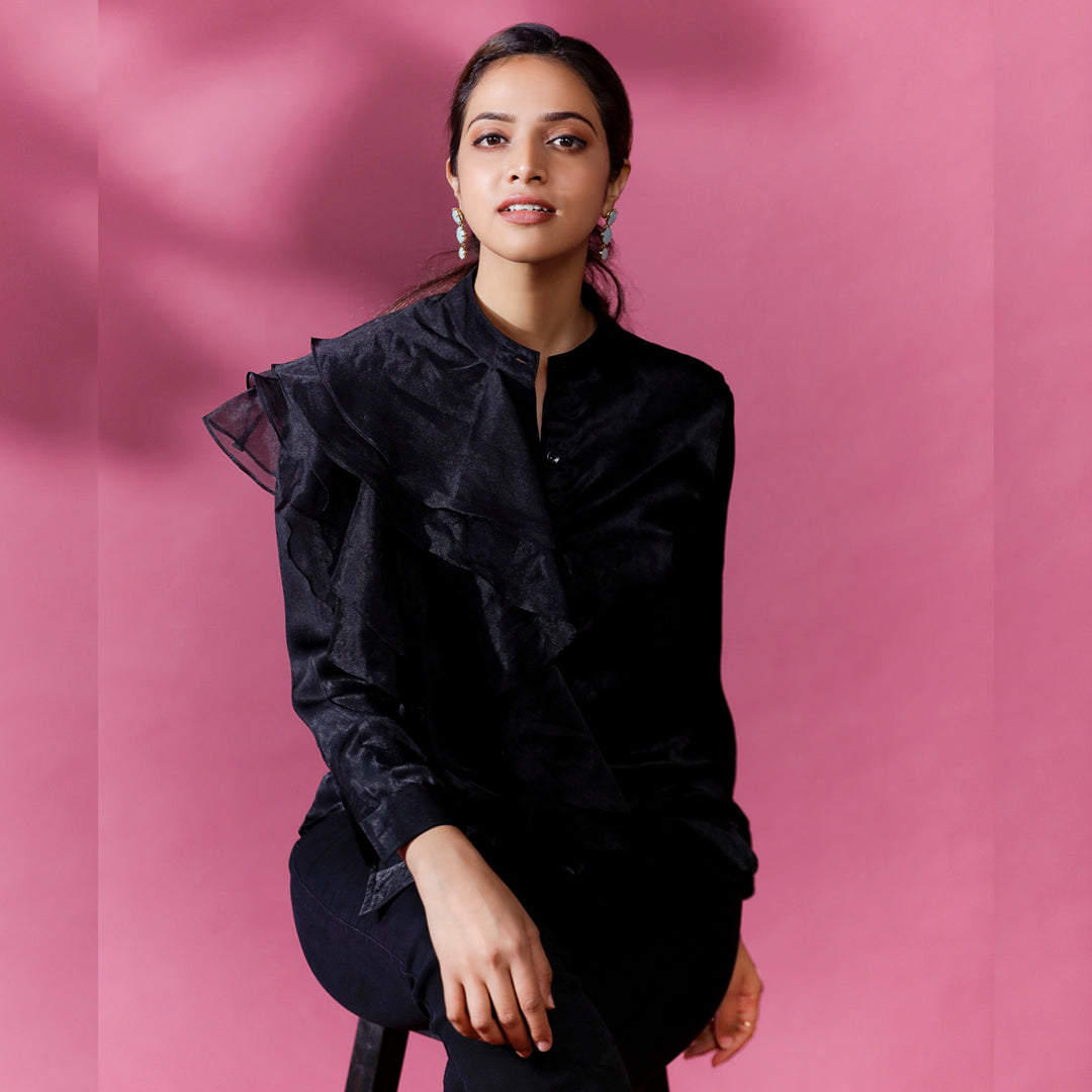 DREAMY ORGANZA RUFFLED SHIRT - This shirt features ruffles made from a sheer and lightweight fabric called organza which creates an ethereal and delicate look. The ruffles create depth and movement giving it a bold and voluminous look too.