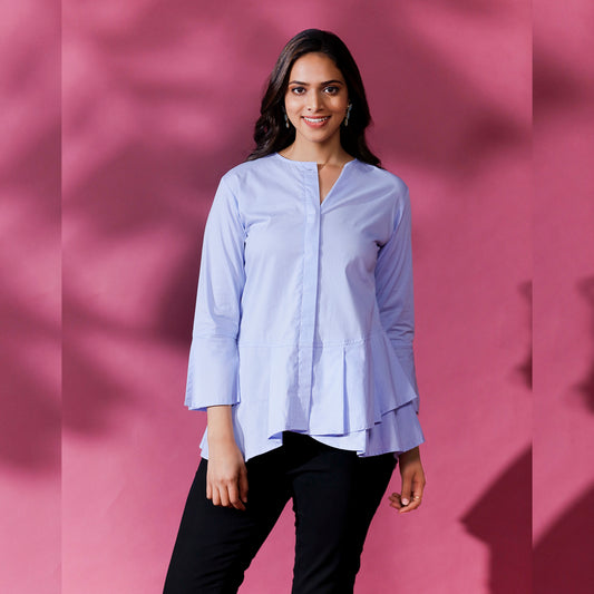 CIRCULAR FRILL SHIRT - This is a classic and stylish shirt with circular frills around the hemline. It is designed with a relaxed fit to provide comfort and ease of movement.