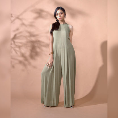 CHILLAX JUMPSIE - This ultra comfortable jumpsuit is in a lovely falling textured material. It has an inverted pleat detail falling along the front. It has a loose fitting silhouette made from lightweight and breathable fabric.