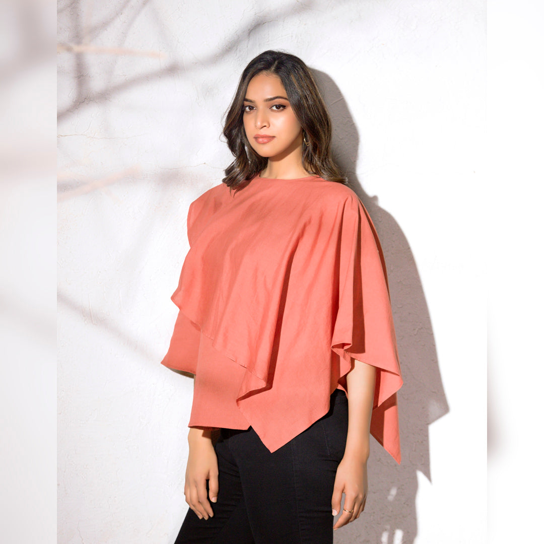 LAYERED SHAWL TOP - This top features a layer of fabric draped over the body in a shawl-like manner. The layer adds volume and dimension to the garment. The shawl-like draping creates a unique and elegant silhouette, making it a popular choice for formal occasions or as a statement piece.