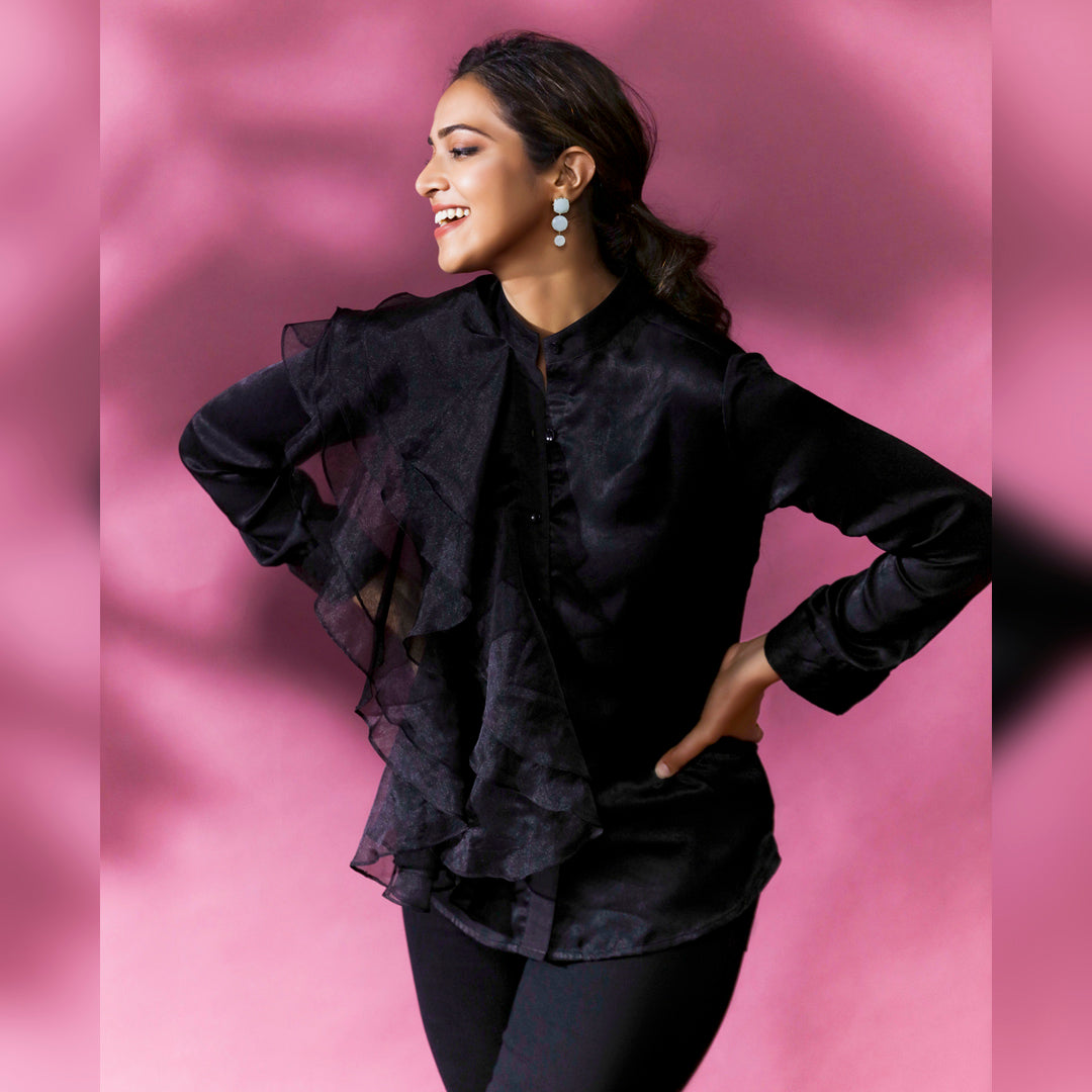 DREAMY ORGANZA RUFFLED SHIRT - This shirt features ruffles made from a sheer and lightweight fabric called organza which creates an ethereal and delicate look. The ruffles create depth and movement giving it a bold and voluminous look too.