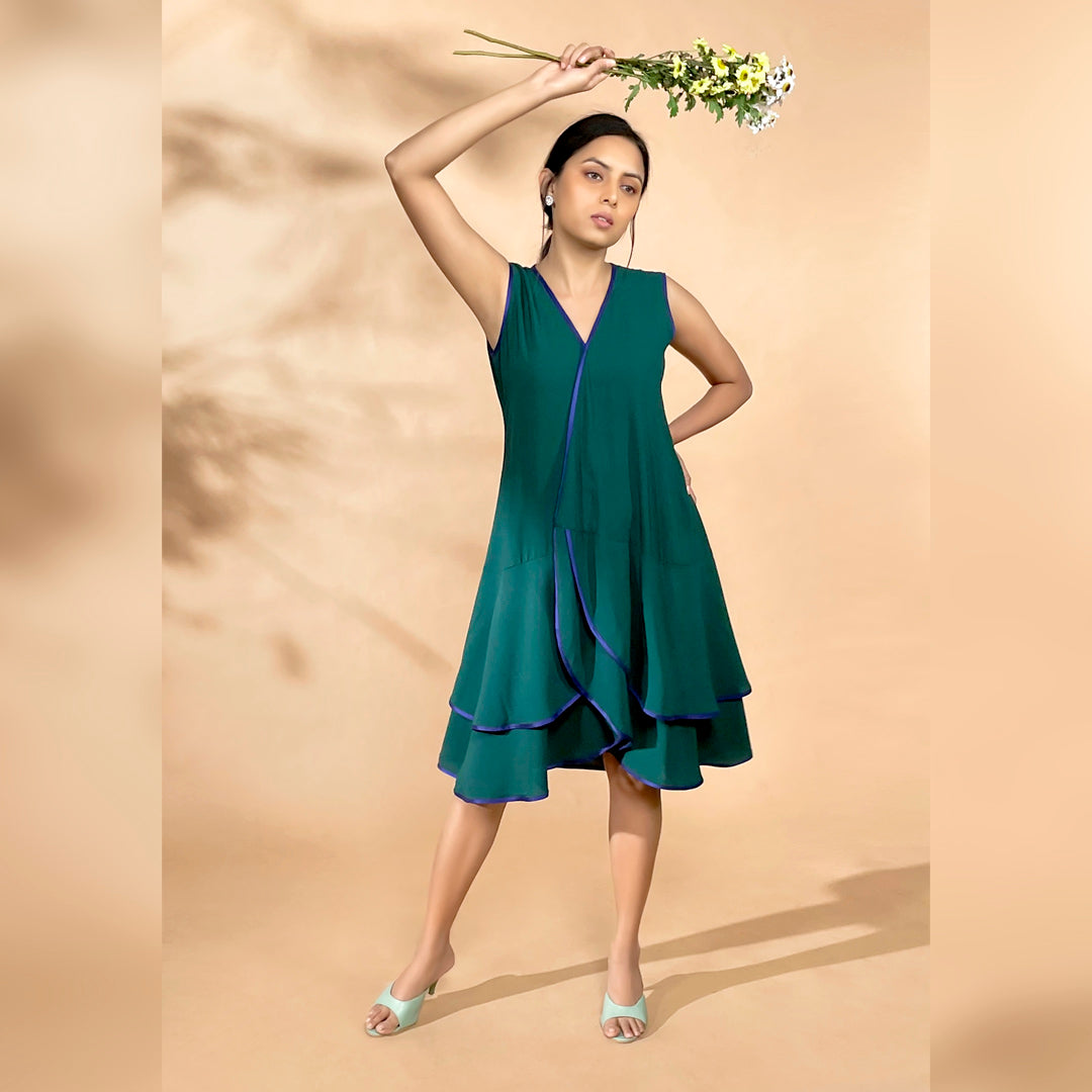 RUFFLED LAYER DRESS - This formal dress has flattering ruffles that add texture and movement to the dress, creating a playful look. The contrasting piping colours bring out the attention to details.